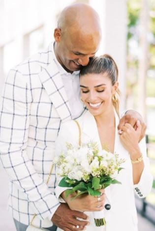 Joy Taylor's brother Jason Taylor and sister in law Monica Velasco on their wedding day.